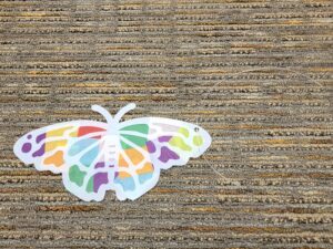 lace stretch of string through one of the holes of your butterfly